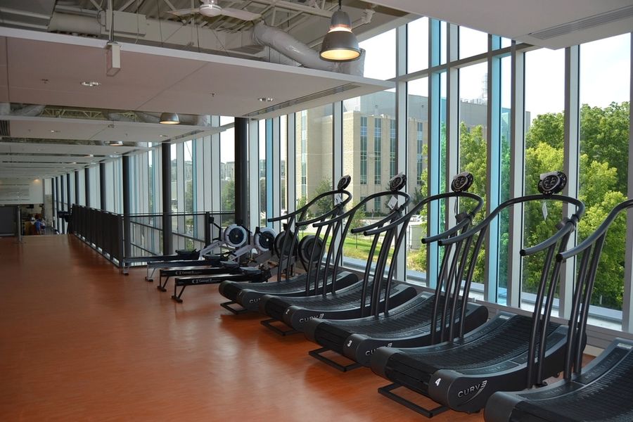 Fitness center with floor-to-ceiling windows